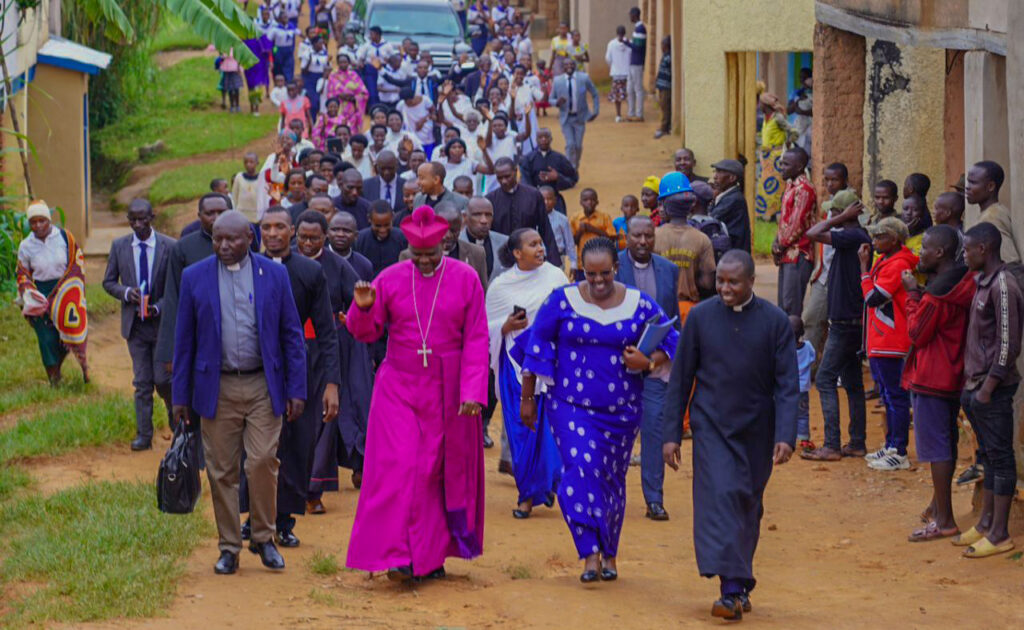 Christians welcoming the Bishop and his delegation