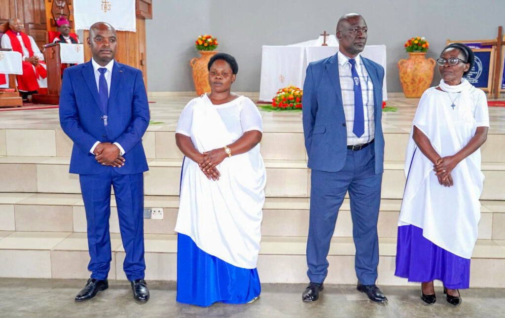 On the left, is the new head of laity Masozera and his wife who replaced Canon Mufasha on the right and his wife