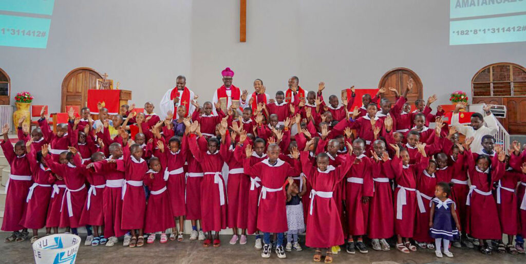 Sunday School Choir dress well in their uniform 